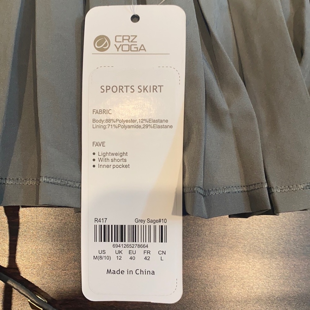Olive green pleaded athletic skirt- never worn
